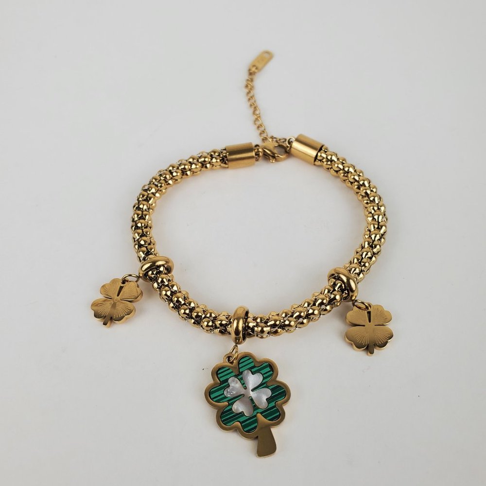Bracelet new with tags , stainless steel , color gold and green